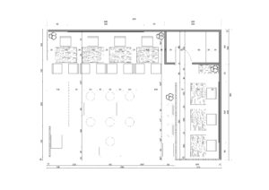 Plan détaillé du stand UMNIA pour l'auto-expo, montrant l'aménagement intérieur et les dimensions des différents espaces